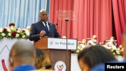 Le président Felix Tshisekedi prononce son discours annuel sur l'état de la nation lors d'une session conjointe du parlement à Kinshasa, en République démocratique du Congo, le 13 décembre 2021. 