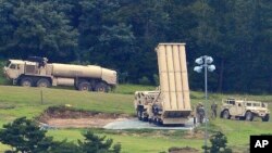 FILE - U.S. missile defense system called Terminal High Altitude Area Defense, or THAAD, is seen at a golf course in Seongju, South Korea, Sept. 6, 2017.