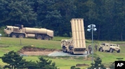 FILE - A U.S. missile defense system known as Terminal High Altitude Area Defense, or THAAD, is seen in Seongju, South Korea, Sept. 6, 2017. Improvements in missile defenses are a high priority item in the 2018 U.S. defense policy bill.