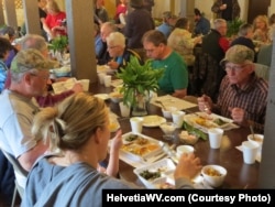 Community members enjoying ramps at the annual Ramp Supper in Helvetia, West Virginia.