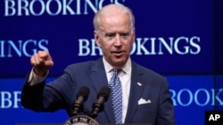 U.S. Vice President Joe Biden, speaking about the conflict in Ukraine at the Brookings Institution in Washington, says “Russia is taking steps to undermine its European neighbors and strengthen its hegemonic position,” May 27, 2015.