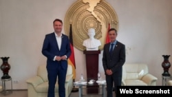 Ông Mark Hauptmann, Nghị sĩ Quốc hội Liên bang Đức, và Đại sứ Việt Nam tại Đức Nguyễn Minh Vũ, tháng 7/2020. Photo vietnambotschaft.org