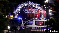 Police secures area where a suspect is sought after a shooting in Strasbourg, France, Dec. 11, 2018. 