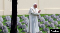 Pope Francis blesses the Austro-Hungarian cemetery at Fogliano in Redipuglia, Sept. 13, 2014. 