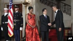Le couple présidentiel américain accueille le président Hu Jintao pour un dîner d'Etat à la Maison-Blanche.