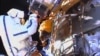 Russians Go Spacewalking to Collect Experiments, Test Glue