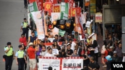 香港民間人權陣線估計約1,500人參與十一拒絕危城遊行。(美國之音特約記者 湯惠芸拍攝 )