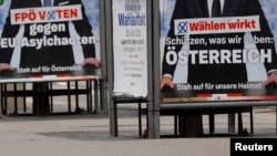European election posters of Austria's Vice Chancellor and Head of Freedom Party Heinz-Christian Strache and top candidate of FPOe for the European elections Harald Vilimsky are seen in Vienna, Austria, April 26, 2019. 