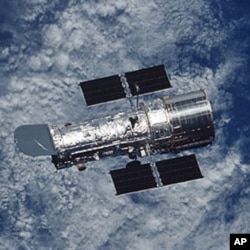 The Hubble Space Telescope, a large, space-based observatory, has revolutionized astronomy by providing unprecedented deep and clear views of the universe.