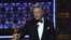 FILE - Actor-comedian Alec Baldwin accepts an award for Outstanding Supporting Actor in a Comedy Series for "Saturday Night Live" during the 69th Emmy Awards at the Microsoft Theatre in Los Angeles, California, Sept. 17, 2017.