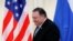 El secretario de Estado de EE.UU., Mike Pompeo, camina frente a una bandera rusa y otra estadounidense durante la cumbre bilateral celebrada en Sochi, Rusia, el 14 de mayo de 2019.