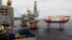 FILE - Equinor's Johan Sverdrup oilfield platforms and accommodation jack-up rig Haven are pictured in the North Sea, Norway, Dec. 3, 2019.
