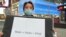 中國留學生時報廣場發口罩  反歧視 