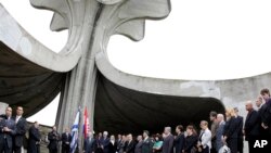 FILE - A ceremony is held at the site of Croatia's notorious WWII-era extermination camp in Jasenovac, Croatia, July, 25, 2010.