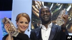 Omar Sy en compagnie de l'actrice Berenice Bejo 