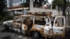 FILE - The remains of a burnt car which was set on fire by a mob during the violence after the assassination of Oromo's pop singer Hachalu Hundessa is seen in Shashamene, Ethiopia, July 12, 2020.