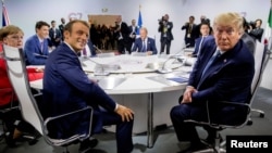 Francuski predsjednik Emmanuel Mavron i predsjednik SAD Donald Trump tokom na sastanku lidera G7