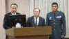 台湾国防部长严明(左一)于3月6号在立法院接受质询(美国之音 张永泰拍摄)