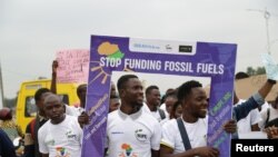 Activists take part in a climate action protest in the streets of Kinshassa, Democratic Republic of Congo September 23, 2022. 