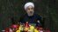Iranian President Hassan Rouhani speaks during a debate in parliament on his proposed cabinet, in Tehran August 12, 2013.