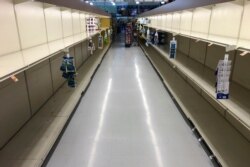 Empty shelves are seen at a grocery store in Willow Grove, Pennsylvania, March 16, 2020, as shoppers have been buying up extra quantities of the products since the outbreak of the coronavirus.