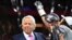 FILE - New England Patriots owner Robert Kraft raises the Vince Lombardi Trophy after winning Super Bowl LIII against the Los Angeles Rams at Mercedes-Benz Stadium in Atlanta, Georgia, U.S., Feb. 3, 2019. 
