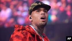 Chris Brown performs at the 2015 Hot 97 Summer Jam at MetLife Stadium in East Rutherford, N.J. Authorities said officers responded to singer Brown's Los Angeles home early Tuesday, Aug. 30, 2016.