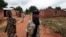 FILE - Seleka rebels walk through the town of Bria, Central African Republic, July 15, 2013. Recent fighting between rival militia groups, some in Bria, has killed 16 people, U.N. peacekeepers said Wednesday, Nov. 23, 2016.