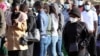 Voters queue to cast their ballots during national elections in Lusaka, Zambia, August 12, 2021. REUTERS/Jean Ndaisenga 