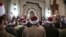 FILE - Muslim clerics are seen gathered at a mosque in central Cairo, Egypt, Feb. 3, 2015. Muslim clerics and scholars not in line with Islamic State postulates have been the latest target of IS propaganda videos.