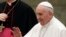 FILE - Pope Francis greets faithful during his weekly general audience, in the Pope Paul VI hall, at the Vatican, Jan. 18, 2017. 