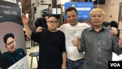 “Trump” and “Kim” pose for photos with salon owner, Tuan Duong, in Hanoi, Vietnam, Feb. 19, 2019. (Photo - courtesy Tuan Duong)