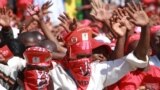 Movement For Democratic Change (MDC) supporters chant the partys slogan as MDC President Morgan Tsvangirai addresses thousands of party supporters at his last campaign rally before elections set for July 31, in Harare.