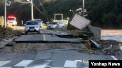 5일 한반도 남부지방에 많은 비를 뿌린 제18호 태풍 차바의 영향으로 울산시 울주군 회야강이 범람하는 모습. 제주도와 남해안·동해안 일대에 큰 피해를 남긴 차바는 동해상으로 빠져나간 뒤 일본에 접근하고 있다.