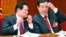 前政治局常委周永康和贺国强