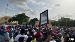 Supporters of Nigerien President Mohamed Bazoum gather to show their support for him in Niamey on July 26, 2023. (Photo by AFP)