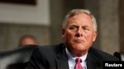 FILE - Senate Intelligence Committee Chairman Richard Burr (R-NC) listens during a Senate Intelligence Committee hearing, Sept. 5, 2018, in Washington.