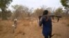 FILE - Cattle keepers walk with their cows near Tonj, South Sudan, Feb. 16, 2020. Cattle keepers are being blamed for the deaths of least eight people in a suspected revenge attack in Central Equatoria state earlier this week.