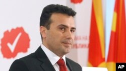 FILE - Zoran Zaev, leader of the opposition Social Democrats, presents the program of the new Macedonian government, at the party headquarters in Skopje, March 10, 2017.