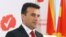FILE - Zoran Zaev, leader of the opposition Social Democrats, presents the program of the new Macedonian government, at the party headquarters in Skopje, March 10, 2017.