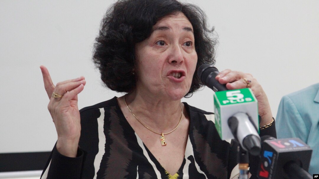 FILE - Leila Zerrougui, special representative of the Secretary-General for Children and Armed Conflict, talks to journalists during a press conference at UNICEF office as she concludes her five-day visit to the nation, July 16, 2015 in Yangon, Myanmar. Her focus now is the DRC.