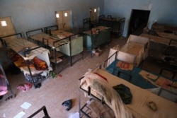 An empty dormitory full of schoolboys' belongings is seen after gunmen abducted students at the Government Science School in Kankara, in northwestern Katsina state, Nigeria, Dec. 15, 2020.