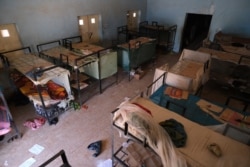 An empty dormitory full of schoolboys' belongings is seen after gunmen abducted students at the Government Science school in Kankara, in northwestern Katsina state, Nigeria, Dec. 15, 2020.