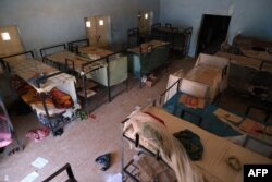 An empty dormitory full of schoolboys' belongings is seen after gunmen abducted students at the Government Science school in Kankara, in northwestern Katsina state, Nigeria, Dec. 15, 2020.