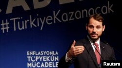 Turkish Finance Minister Berat Albayrak speaks during an event to announce his program to fight inflation, in Istanbul, Oct. 9, 2018. 