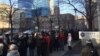 People brave the cold temperatures in hopes of getting a ticket to attend President Barack Obama's farewell speech in Chicago, Jan. 7, 2017. 