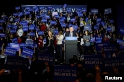 U.S. Democratic presidential candidate Bernie Sanders speaks at his caucus night rally Des Moines, Iowa, Feb. 1, 2016.