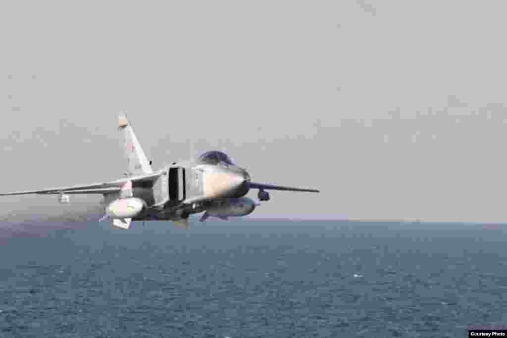 Image of Russian fly-over near guided-missile destroyer USS Donald Cook in Baltic Sea as provided by the U.S. Navy 6th Fleet.