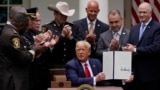 Trump Signs Executive Order on Policing