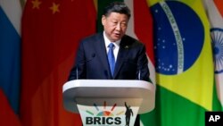 Presiden China Xi Jinping berbicara pada pembukaan KTT BRICS di Johannesburg, Afrika Selatan (25/7). 